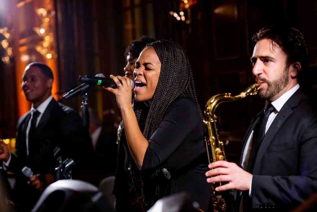 Vocalist and saxophonist performing Song List